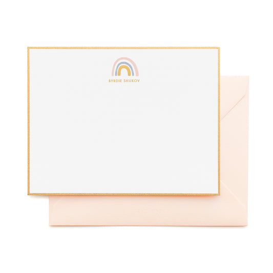 Rainbow custom stationery with gold border and pink envelope