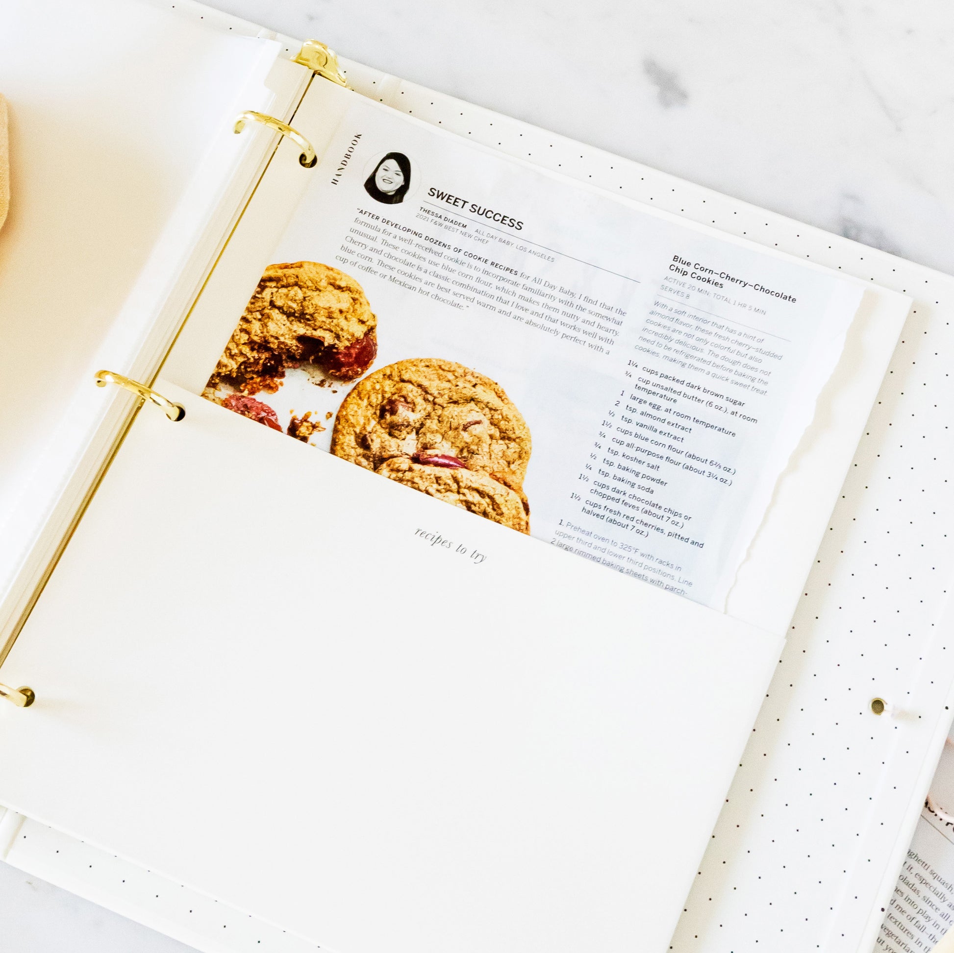 open recipe binder showing folder pocket