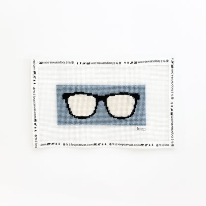 completed dusty blue sunglasses needlepoint kit