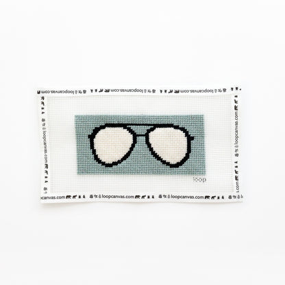completed office green sunglasses needlepoint kit