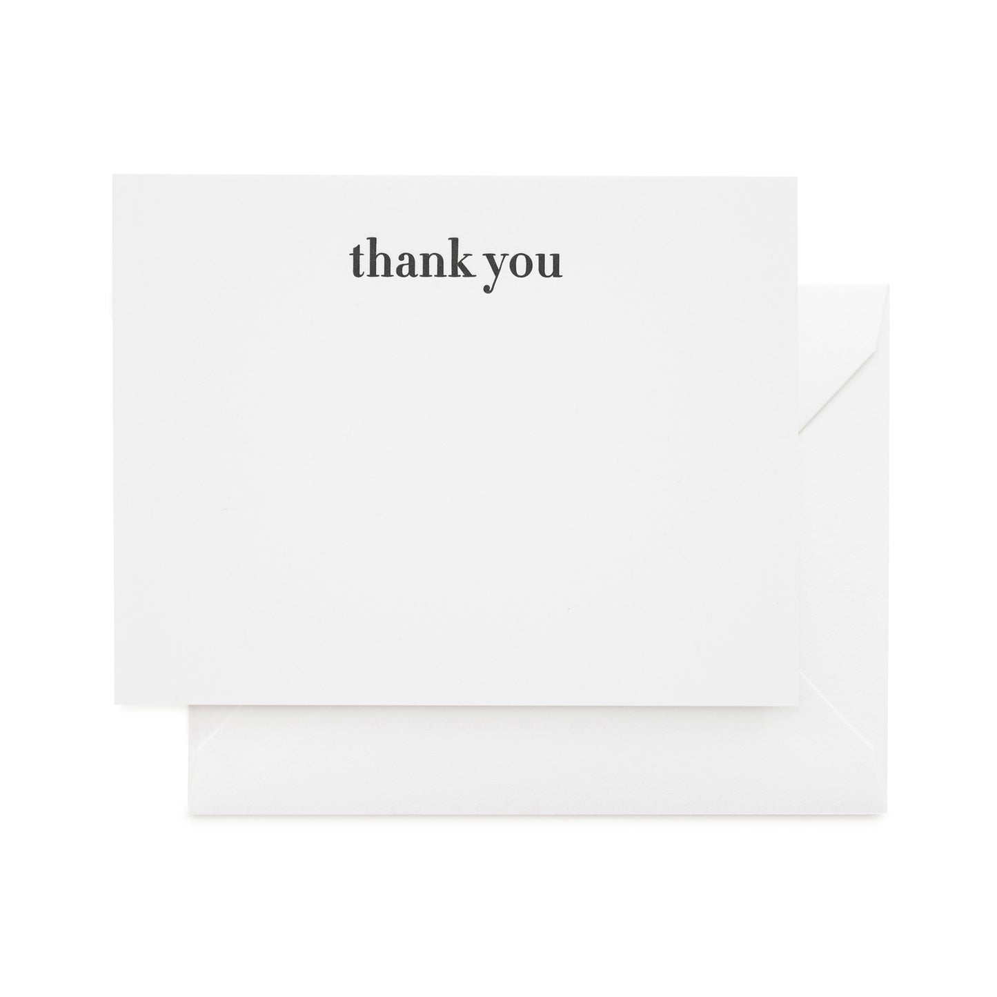 white card with black thank you text and white envelope