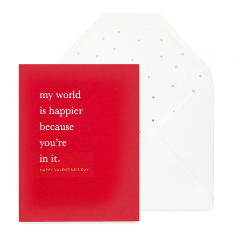 red card with white and gold text, white envelope with gold scattered heart liner