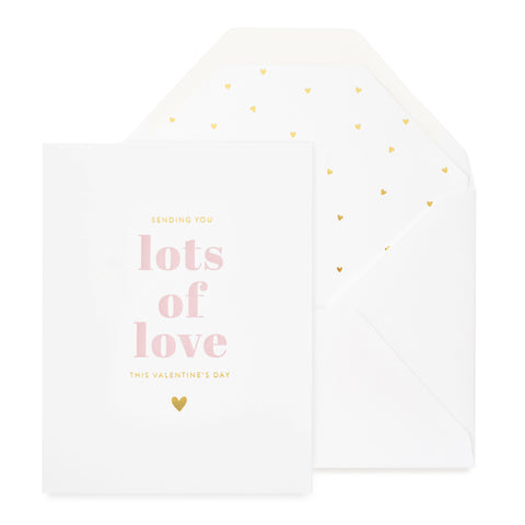 white card with rose and gold text, white envelope with gold scattered heart liner