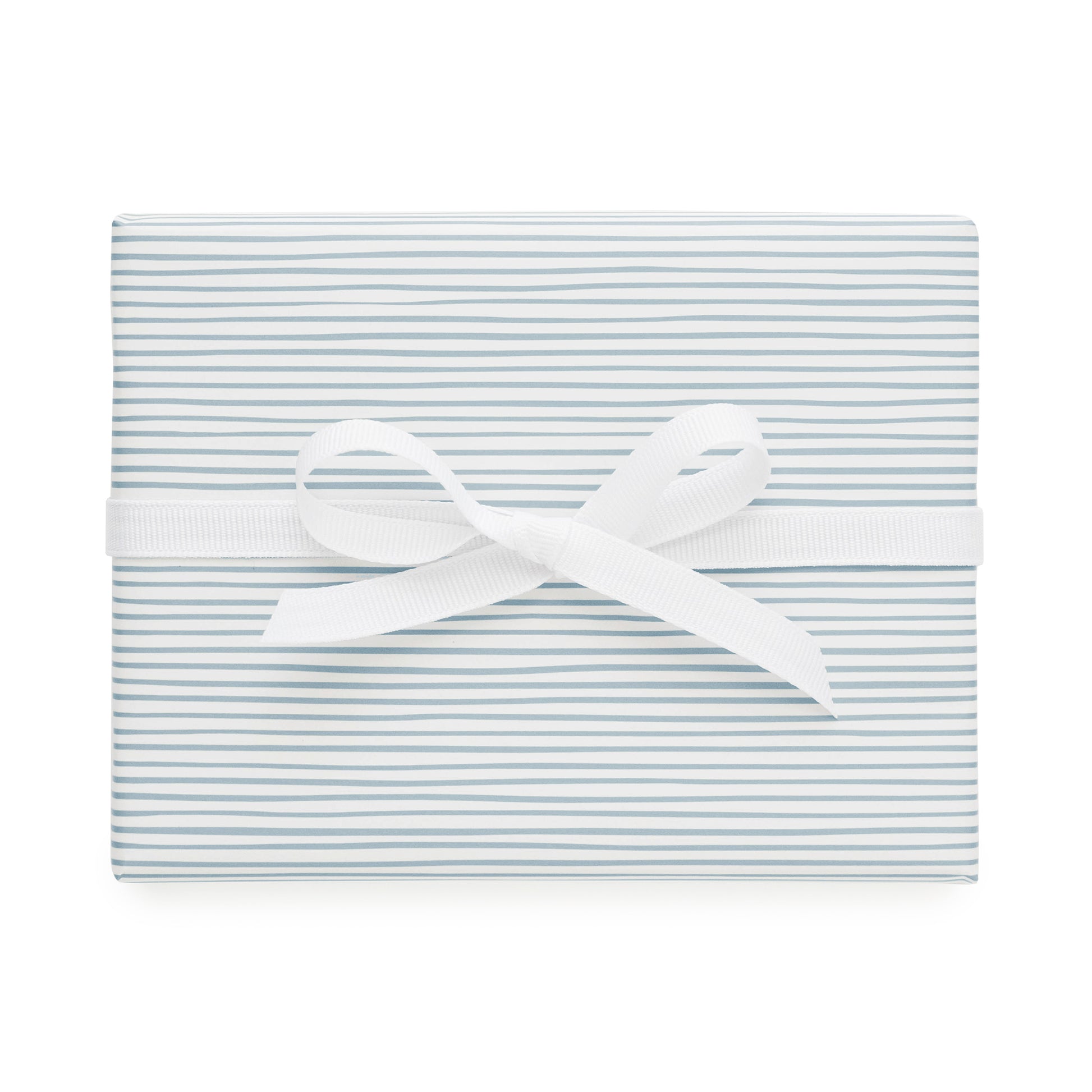 white gift wrap with painted blue stripes and white bow